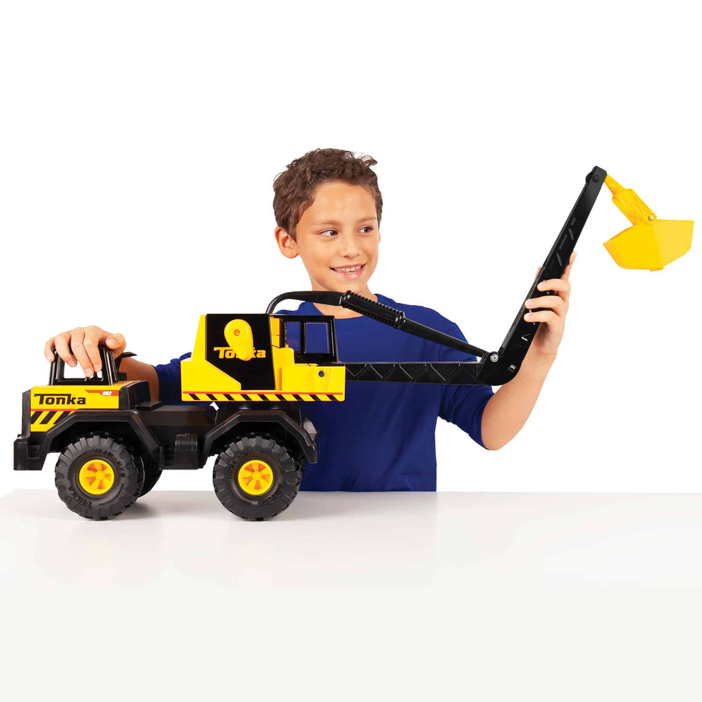 Tonka Crane lifestyle shot of boy lifting the crane