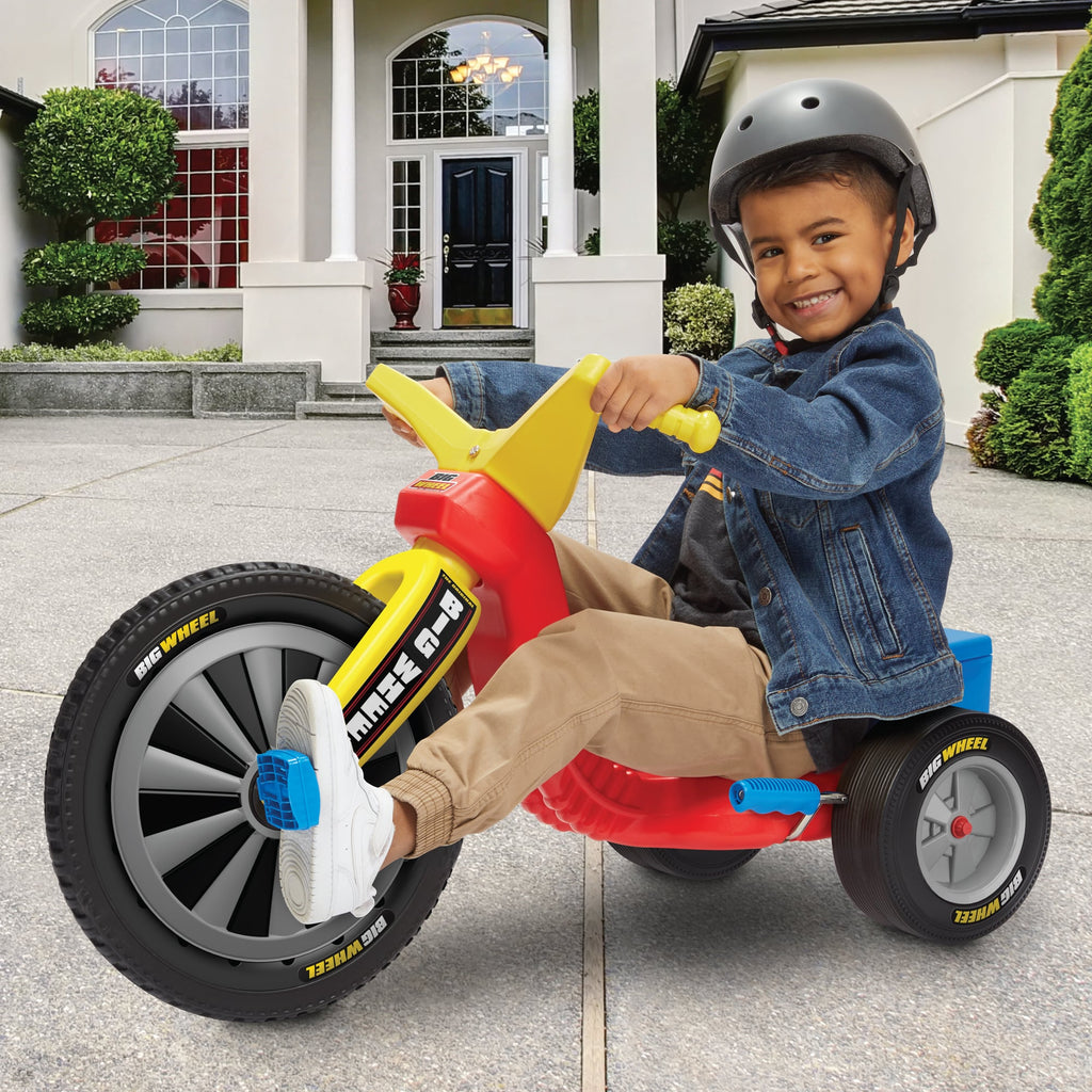 Big Wheel Big Spin 16 Inch - Lifestyle image of boy on Big Wheel